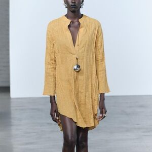 Pleated linen tunic dress